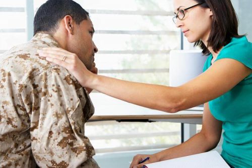 woman comforting veteran with ptsd